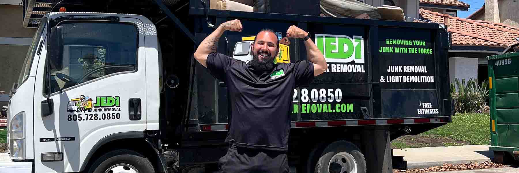 Junk removal crew loading a truck, featured photo for Autopilot's 2025 industry outlook